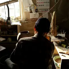 明山陶業（株）