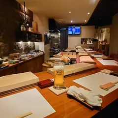 すし明