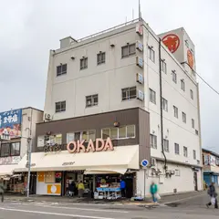 ㈱丸市岡田商店
