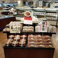 （株）まるおか